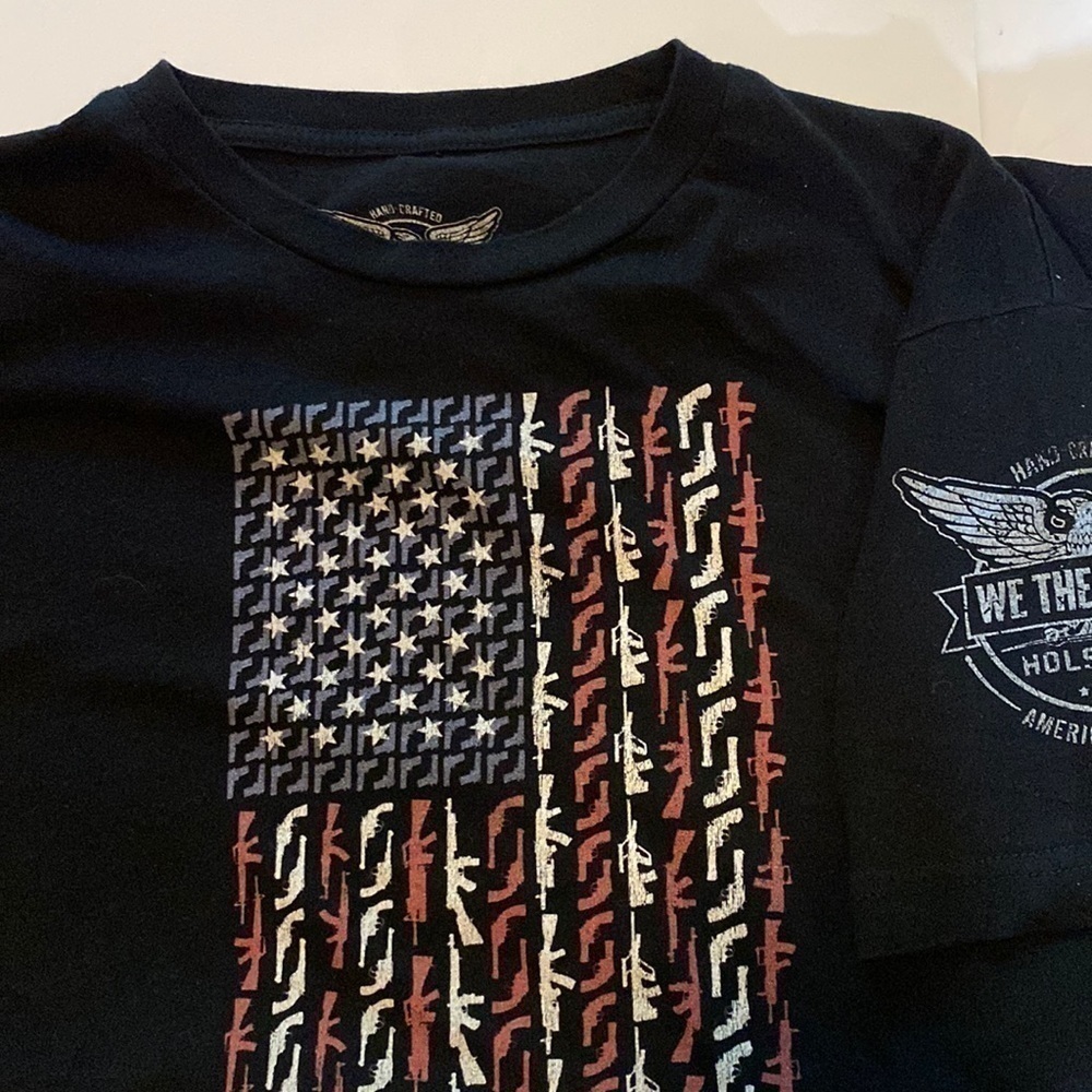 We The People women’s short, sleeved T-shirt, size medium